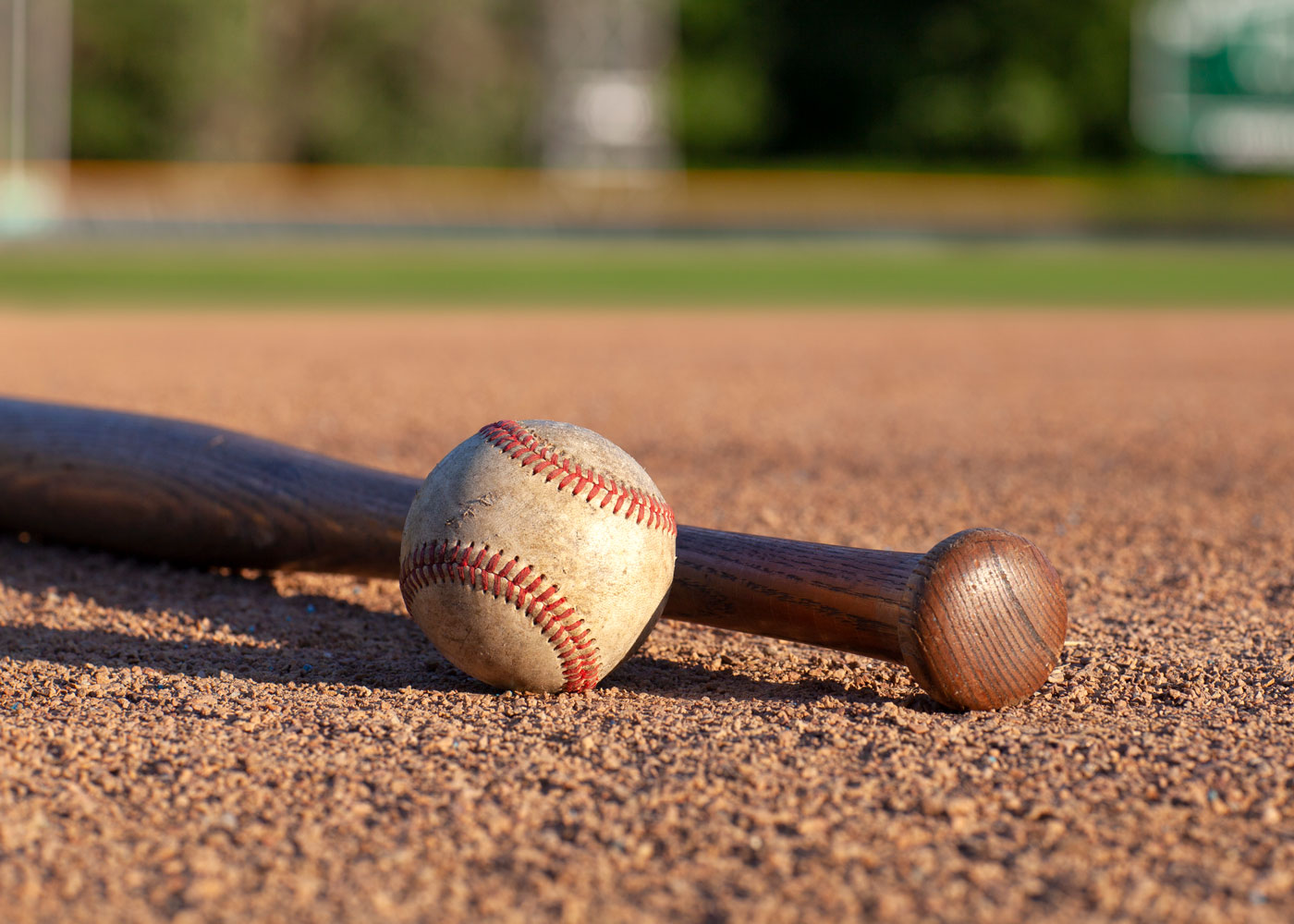baseball-and-bat-low-angle-view-on-a-baseball-fiel-2021-09-04-09-06-50-utc